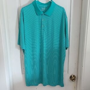 Nike Blue Polo Shirt with Classic Design and Ribbed Texture